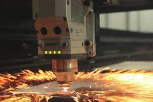 Laserový řezací stroj s podavačem odvíjení realizuje odvíjení a řezání v jednom